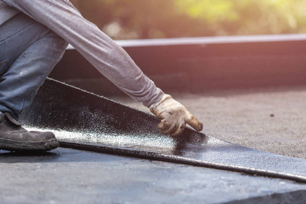 Professional Exterior Waterproofing technician working in Fayetteville, NY